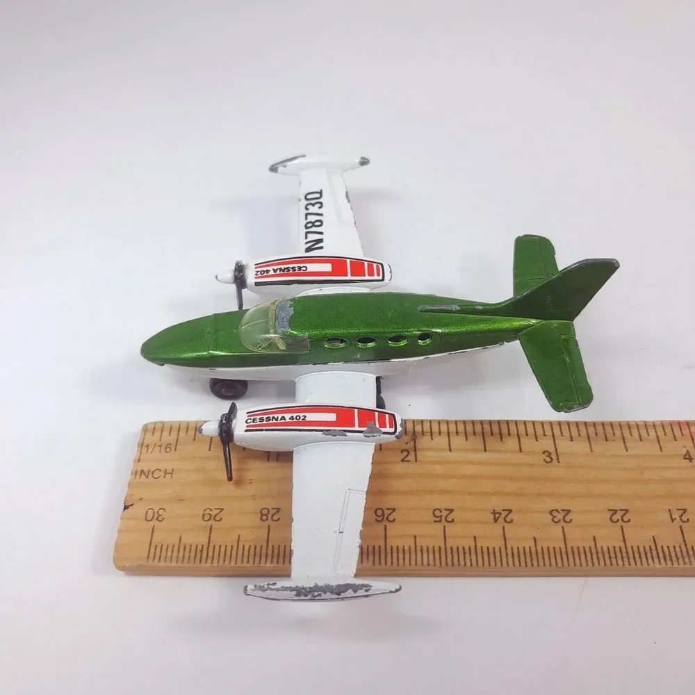MATCHBOX Sky Busters 1974 SP9 Cessna 402 plane Airplane Macau Diecast green